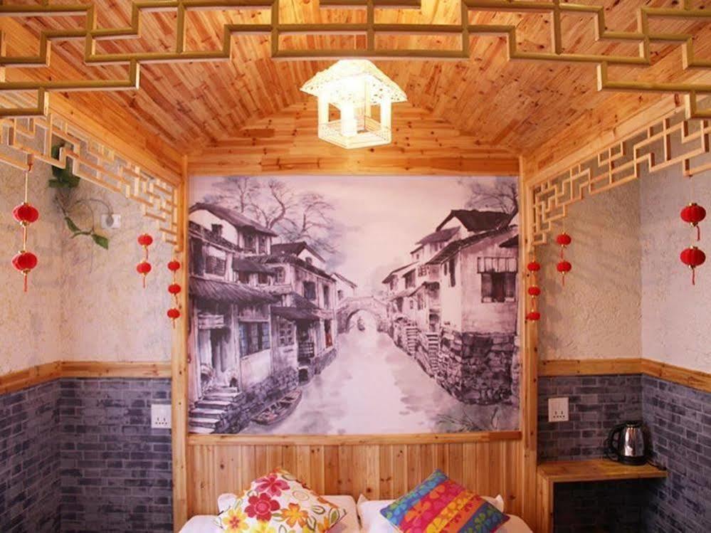 Full House Theme Hotel Wuzhen 嘉興市 エクステリア 写真